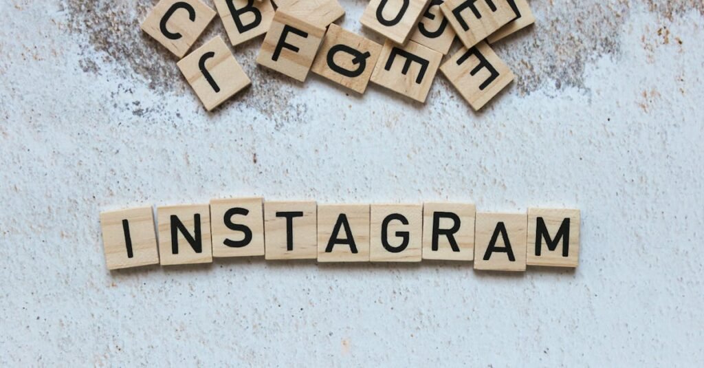 Wooden letter blocks arranged to spell 'Instagram' on a textured surface.
